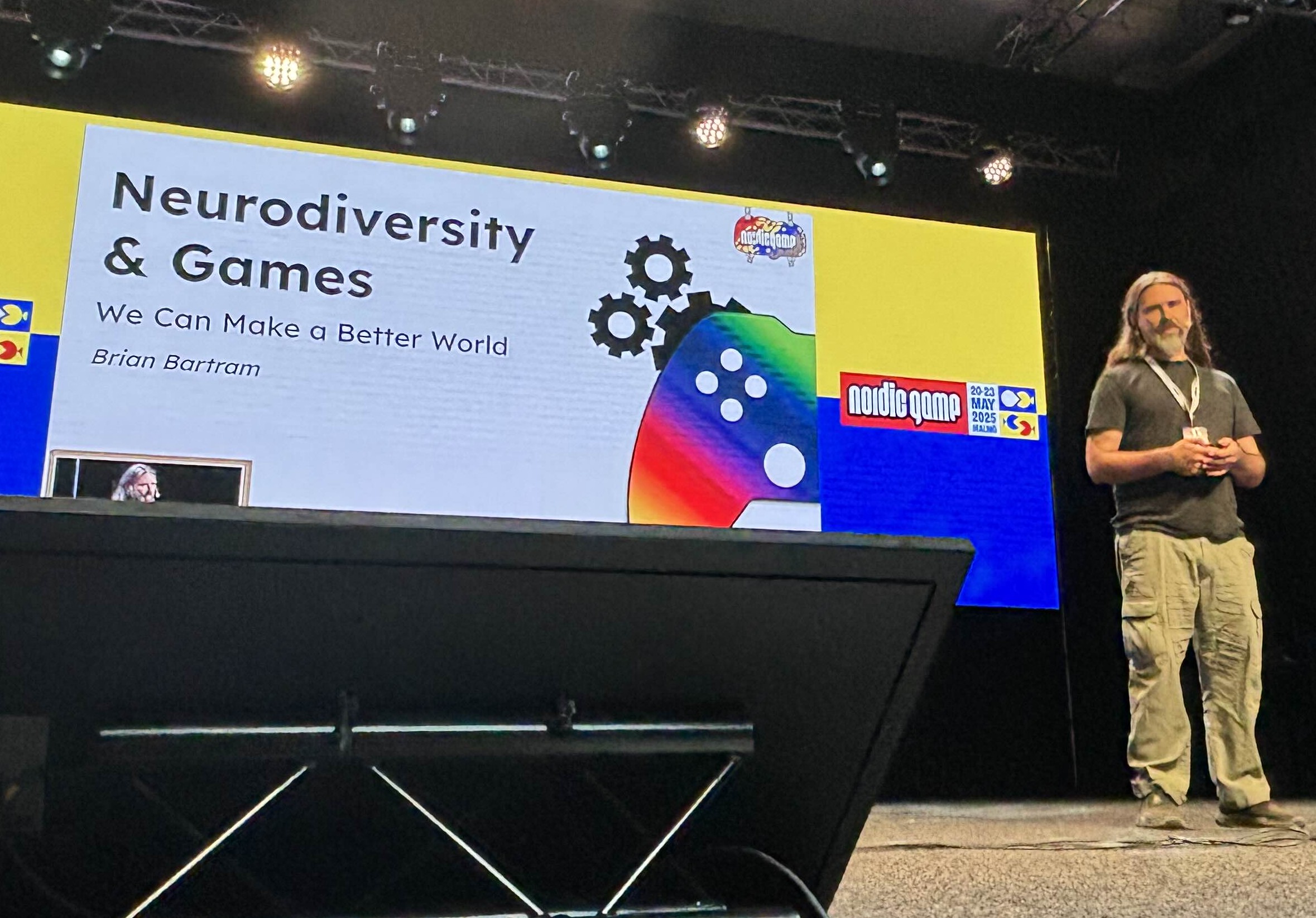 A game development team in a neurodiversity awareness session, discussion in progress